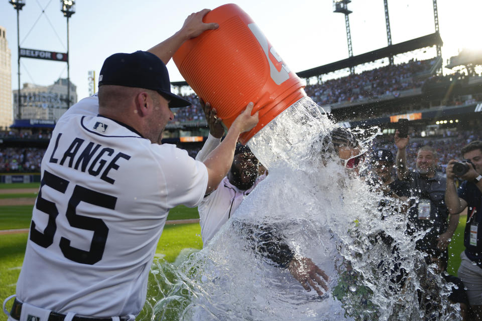 Detroit Tigers' Miguel Cabrera is doused with water by Alex Lange (55) and Akil Baddoo after a baseball game against the Cleveland Guardians, Sunday, Oct. 1, 2023, in Detroit. Cabrera will retire after the game. (AP Photo/Paul Sancya)