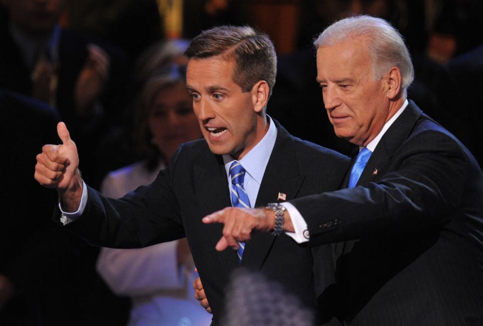 <span class="caption">Joe Biden, right, and his son Beau had a strong relationship until Beau's death in 2015.</span> <span class="attribution"><a class="link " href="https://www.gettyimages.com/detail/news-photo/democratic-vice-presidential-nominee-joe-biden-and-his-son-news-photo/1229510929" rel="nofollow noopener" target="_blank" data-ylk="slk:Paul J. Richards/AFP via Getty Images;elm:context_link;itc:0;sec:content-canvas">Paul J. Richards/AFP via Getty Images</a></span>