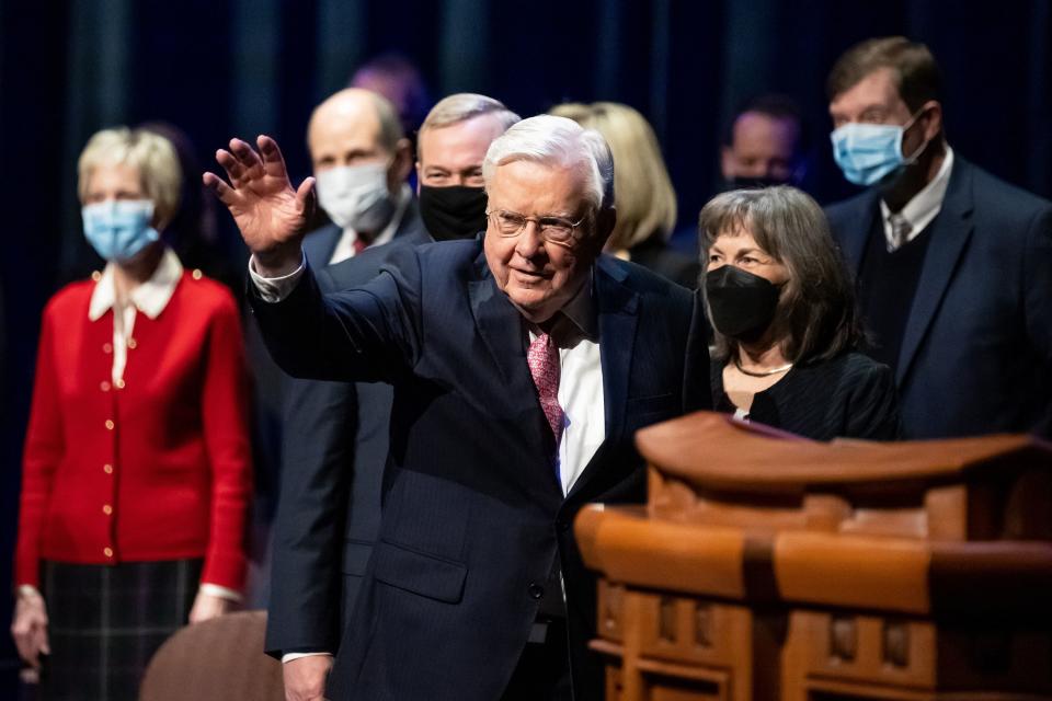 President M. Russell Ballard waves to the audience at the Conference Center Little Theatre in Salt Lake City.