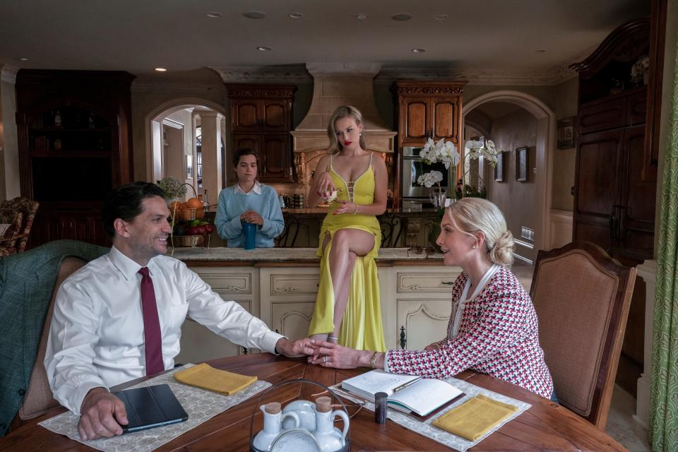 (L to R) Will Swenson as Sebastian Fairmont, Sarah Catherine Hook as Juliette, Gracie Dzienny as Elinor Fairmont, Elizabeth Mitchell as Margot Fairmont in episode 101 of First Kill. (Brian Douglas/Netflix)