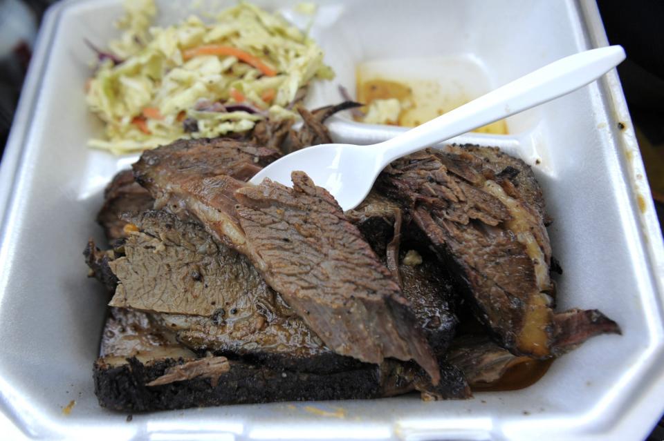 Tender Texas-style brisket is served on the Beer Bones BBQ food truck on Thursday, March 28, 2024.