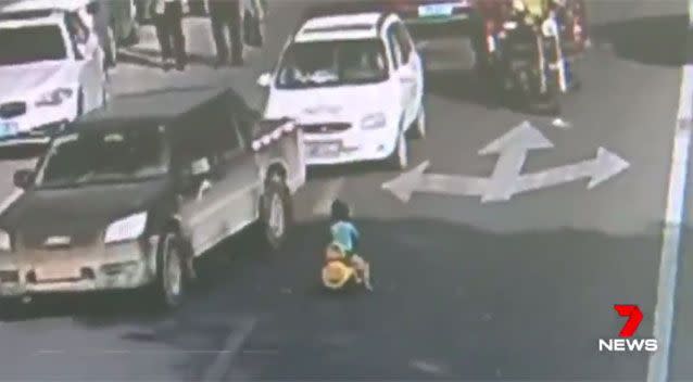 The little boy caught in the busy traffic. Source: 7News