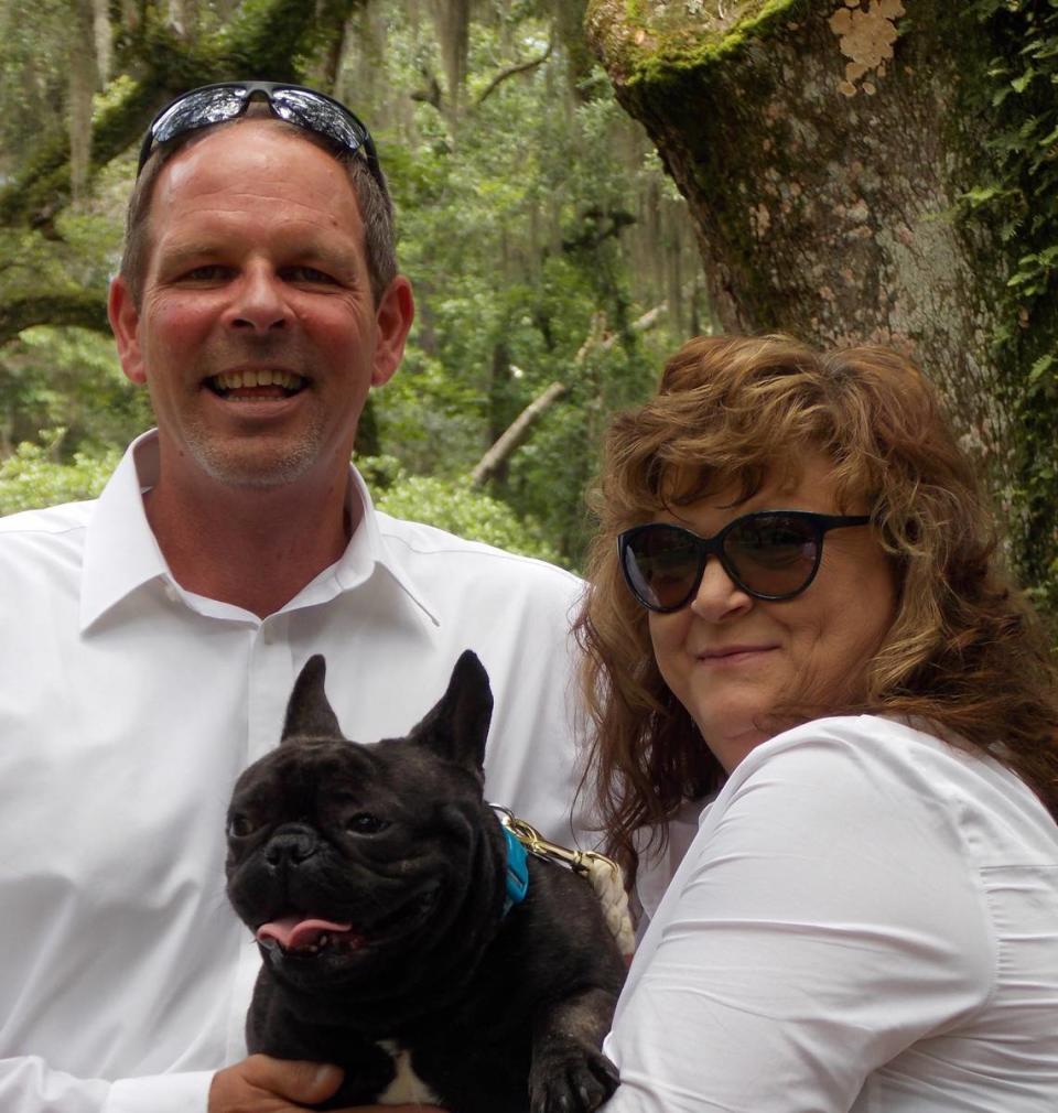 Tom and Cindy Lamprecht and their dog Diesel in 2020.