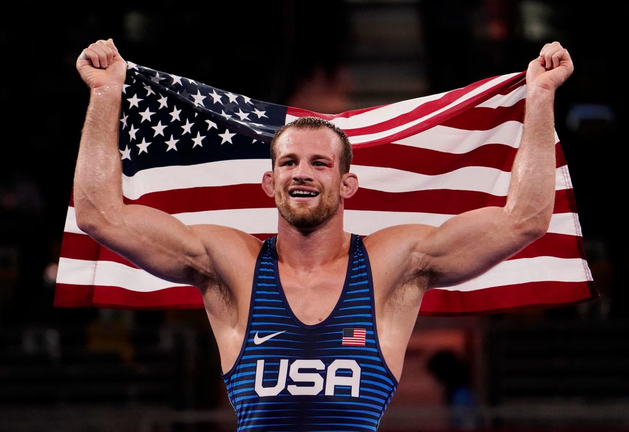 Team USA's David Taylor celebrates after defeating Iran's Hassan Yazdanicharati in the men's freestyle 86-kilogram final at the Tokyo Olympics on Aug. 5, 2021.