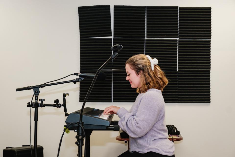 Kami Huff, pictured in her Dover Township home studio in the basement, is a Dover High School student and recording artist.