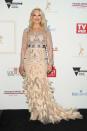 <p>TV presenter Kerri-Anne Kennerley shone bright on the red carpet in a nude gown dotted with a shimmering diamanté bodice and feathered train.</p>