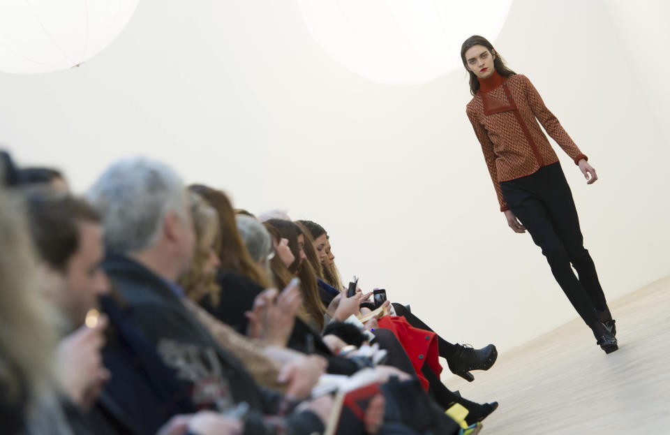 A model displays a creation by designer Pringle of Scotland during a fashion show at London Fashion Week, Monday, Feb. 20, 2012. (AP Photo/Jonathan Short)