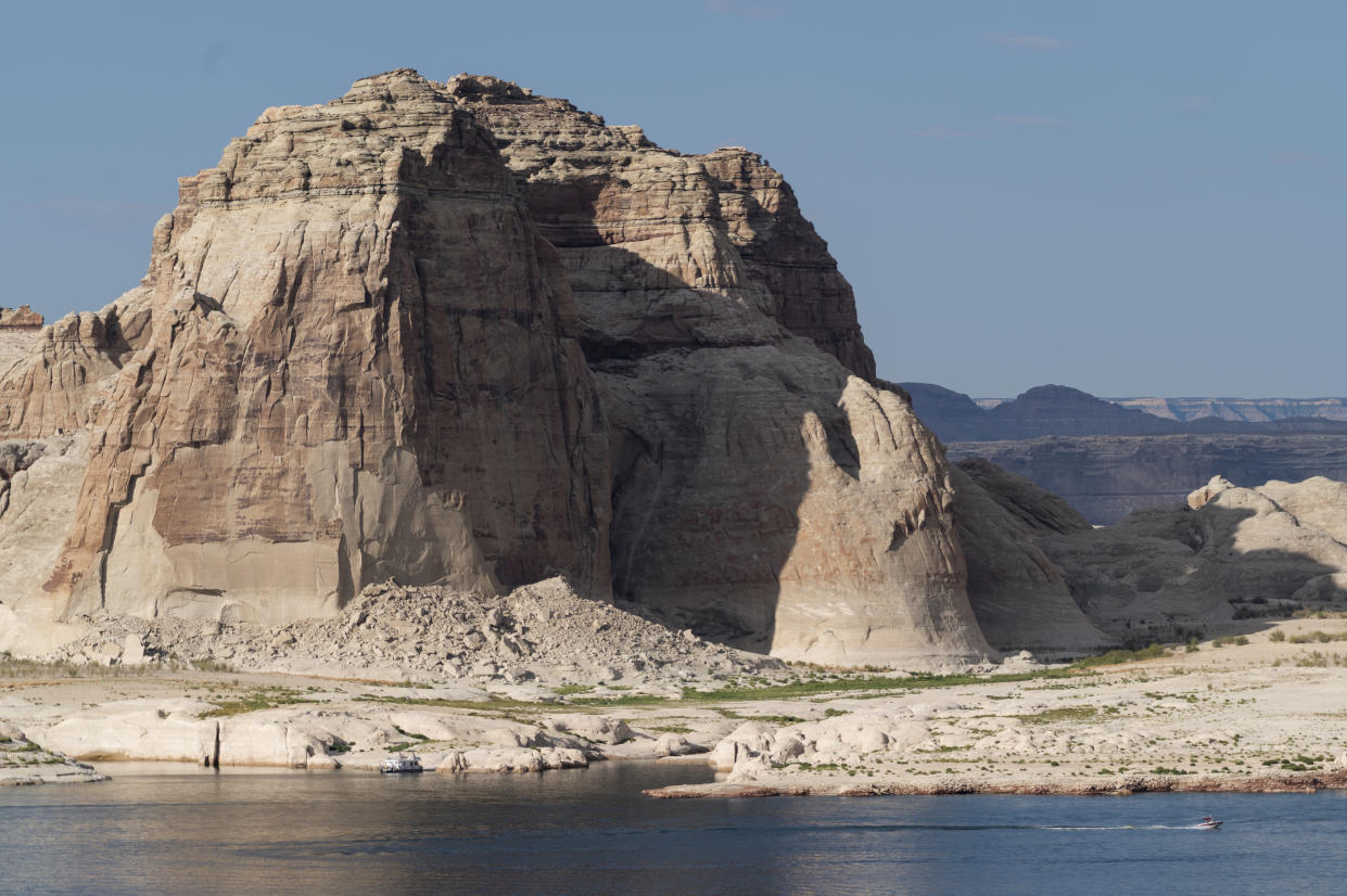 A jboat glides along Lake Powell on Wednesday, August 25, 2021. (Photo by Bill Clark/CQ-Roll Call, Inc via Getty Images)