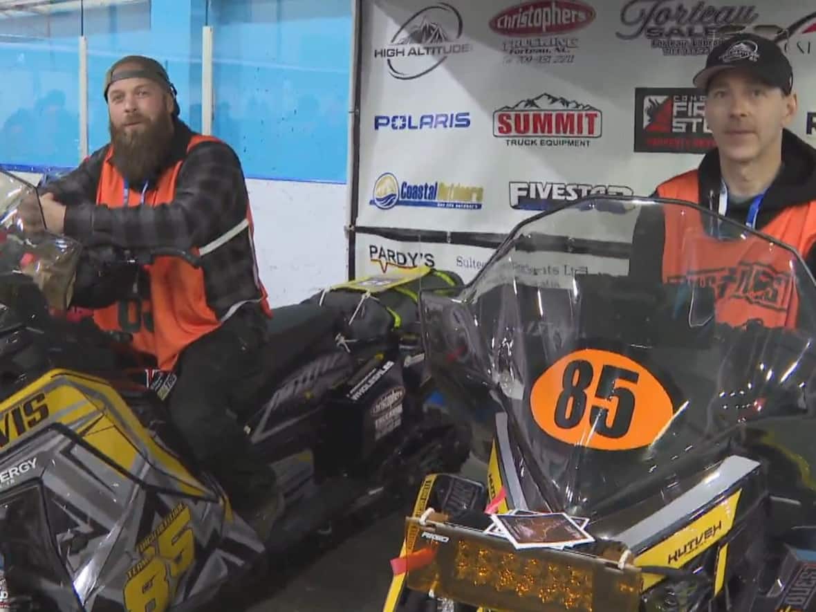 Christopher Davis and Kelsey Belben are racing in honour of Davis’s cousin Zachary, who died in a dirt bike accident last year. (Danny Arsenault/CBC - image credit)
