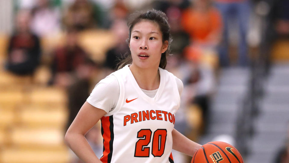 Princeton guard Kaitlyn Chen (20) dribbles the ball against Harvard during the second half of the Ivy League championship NCAA college basketball game, Saturday, March 11, 2023 in Princeton, N.J. Princeton won 54-48. (AP Photo/Noah K. Murray)