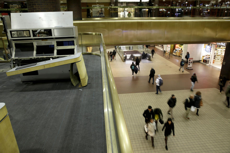 FILE — In this March 19, 2015 file photo, a portion of the old control center, left, sits idle at the Port Authority Bus Terminal in New York. New York City's main bus terminal, long ridiculed for leaky ceilings, dirty bathrooms and frequent delays, could be in for a major overhaul. The Port Authority of New York and New Jersey unveiled a plan Thursday, Jan. 21, 2021, to rebuild and expand the embattled midtown Manhattan bus terminal. (AP Photo/Seth Wenig, File)