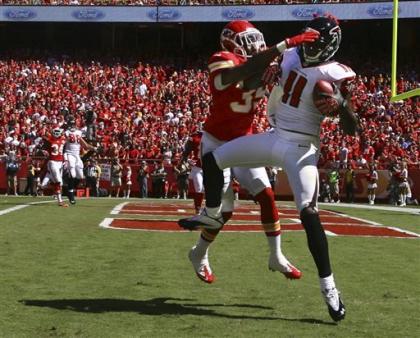 Julio Jones comes down with one of his two scores against the Chiefs. (AP)