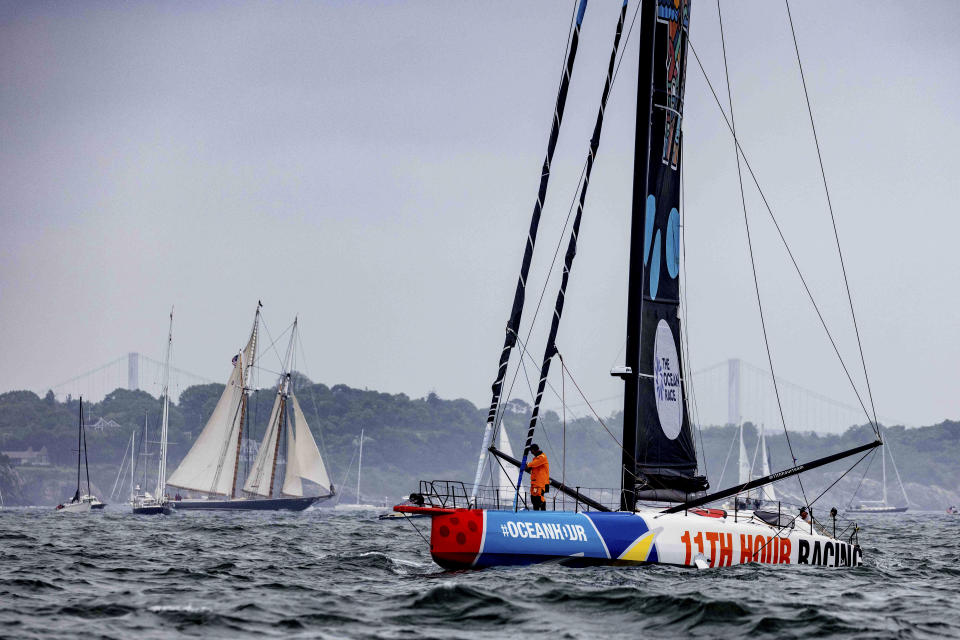 In this photo provided by 1 Degree/11th Hour Racing Team, 11th Hour Racing begins the Newport Bermuda Race off Newport, R.I., Friday, June 17, 2022. Big wave surfer Ian Walsh and snowboarder Elena Hight anticipate the ride of their lives when they sail with the crew of 11th Hour Racing in the race. (Harry KH/11th Hour Racing via AP)