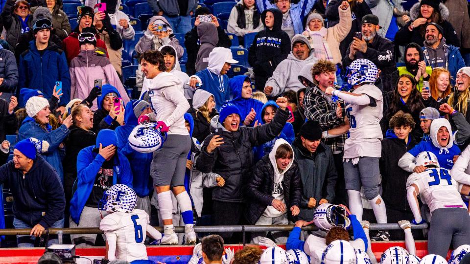 Fairhaven players celebrate their Super Bowl victory with their fans.