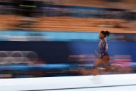<p>USA's Simone Biles competes in the artistic gymnastics vault event of the women's qualification during the Tokyo 2020 Olympic Games at the Ariake Gymnastics Centre in Tokyo on July 25, 2021. (Photo by Martin BUREAU / AFP) (Photo by MARTIN BUREAU/AFP via Getty Images)</p> 