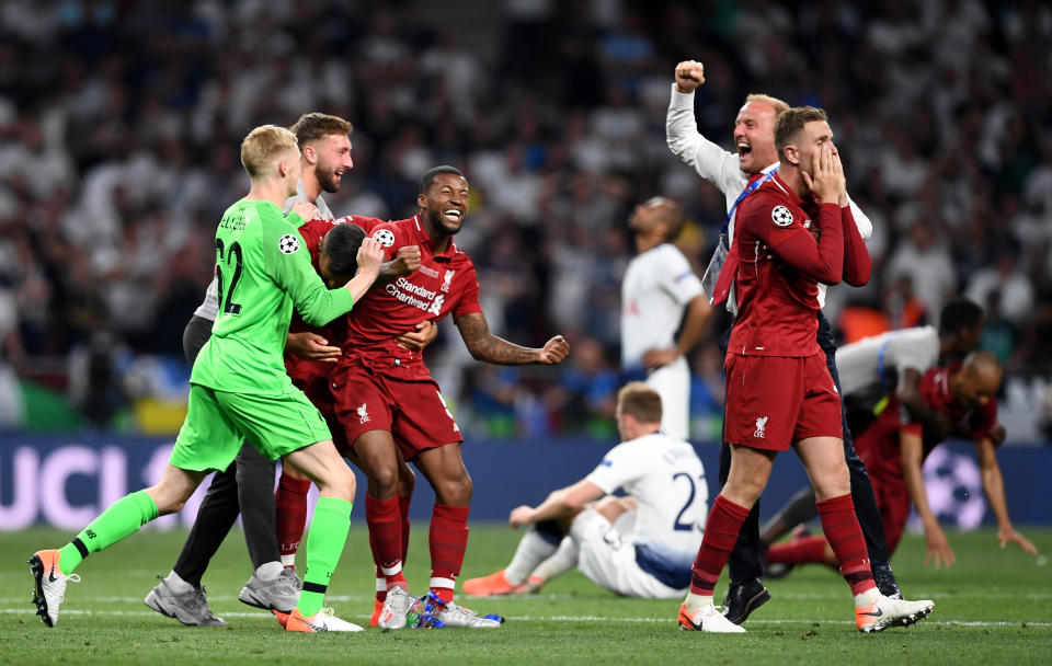 MADRID, SPAIN - JUNE 01: Liverpool players celebrate at full time during the UEFA Champions League Final between Tottenham Hotspur and Liverpool at Estadio Wanda Metropolitano on June 01, 2019 in Madrid, Spain. (Photo by Harriet Lander/Copa/Getty Images)