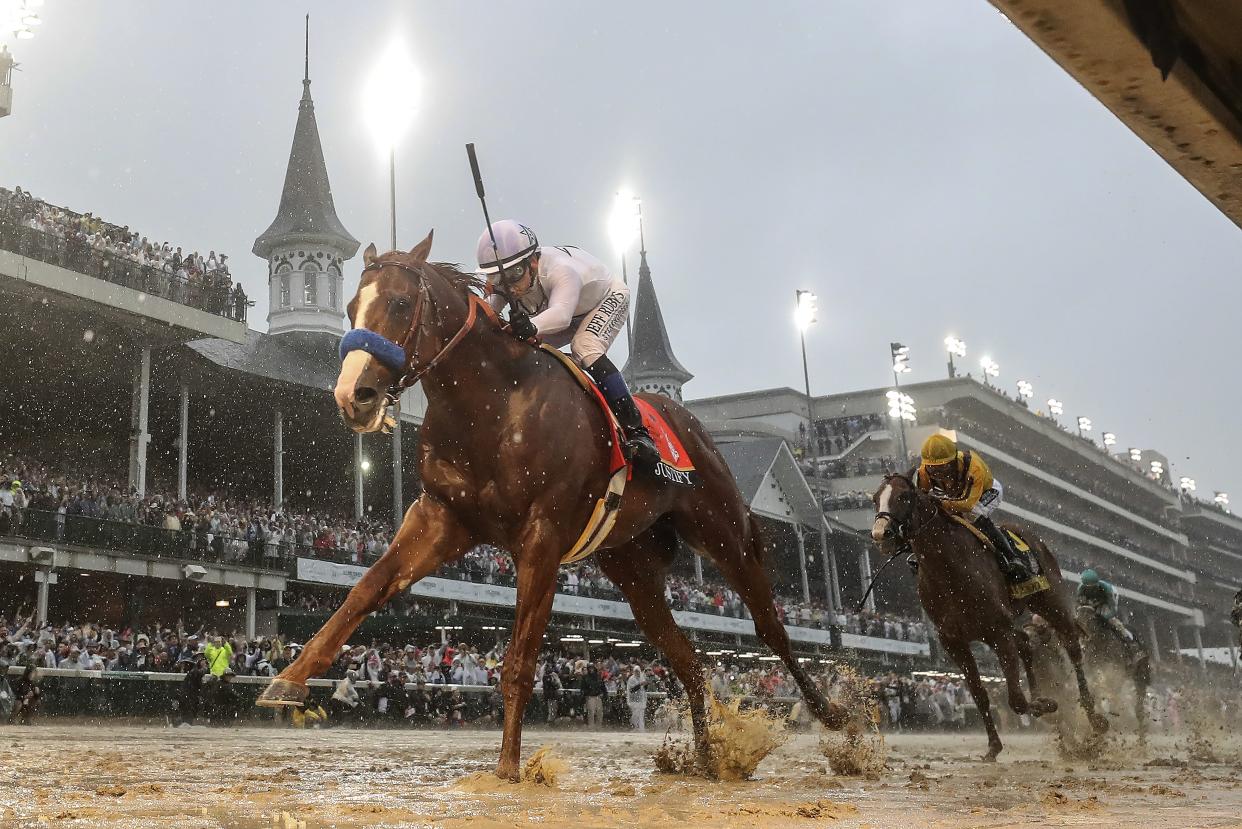 Justify, with Mike Smith aboard, wins the 144th running of the Kentucky Derby in 2018.