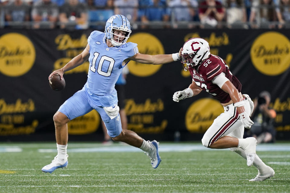 North Carolina quarterback Drake Maye (10) led his team to an impressive win over South Carolina on Saturday in Charlotte, N.C. (AP Photo/Erik Verduzco)