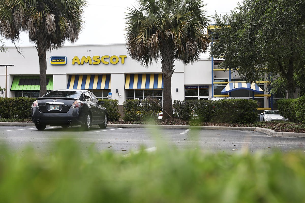 An Amscot store, which provides payday loans, is pictured in Orlando, Fla., on Friday, July 19, 2017.
