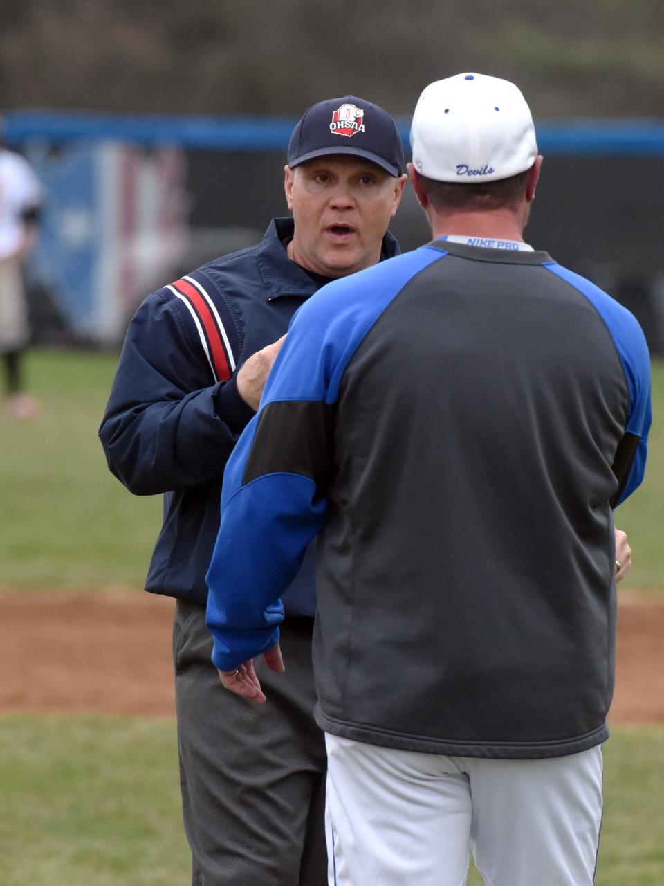 Field umpire Scott Welker and Zanesville coach David Balo argue during a game against River View in 2019. Welker, who has officiated baseball, basketball and football in a 33-year career, was inducted into the Ohio High School Athletic Association Hall of Fame last weekend in Columbus.