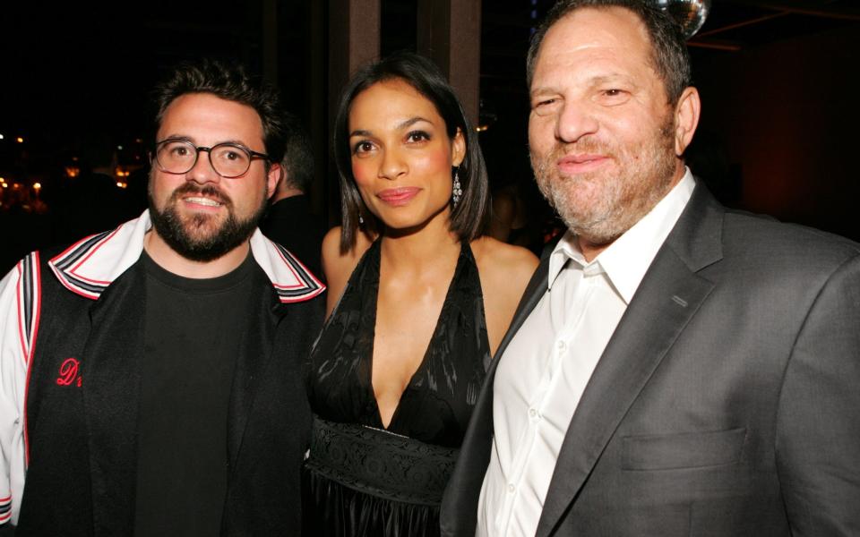 Kevin Smith with Rosario Dawson and Harvey Weinstein, in 2006 - WireImage