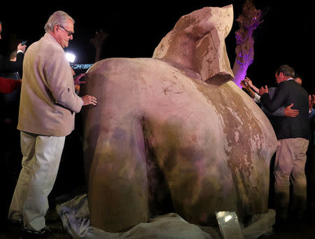 Prince Henrik of Denmark stands beside the collosus now believed to be of Psammetich I in Cairo, Egypt, March 16, 2017. REUTERS/Mohamed Abd El Ghany