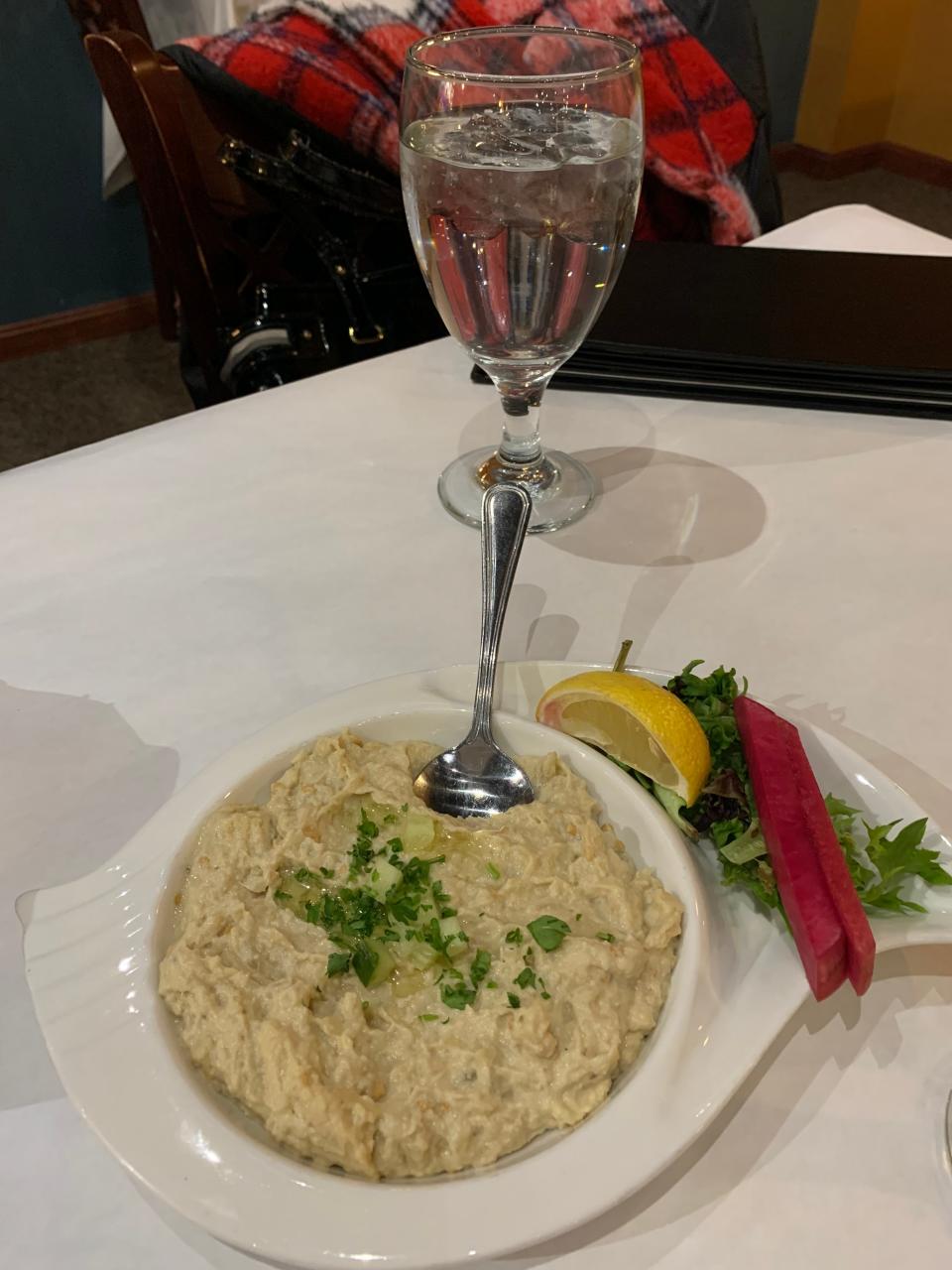 Baba ghanoush comes with pita bread and grilled naan can be added at Laziza in Kent.