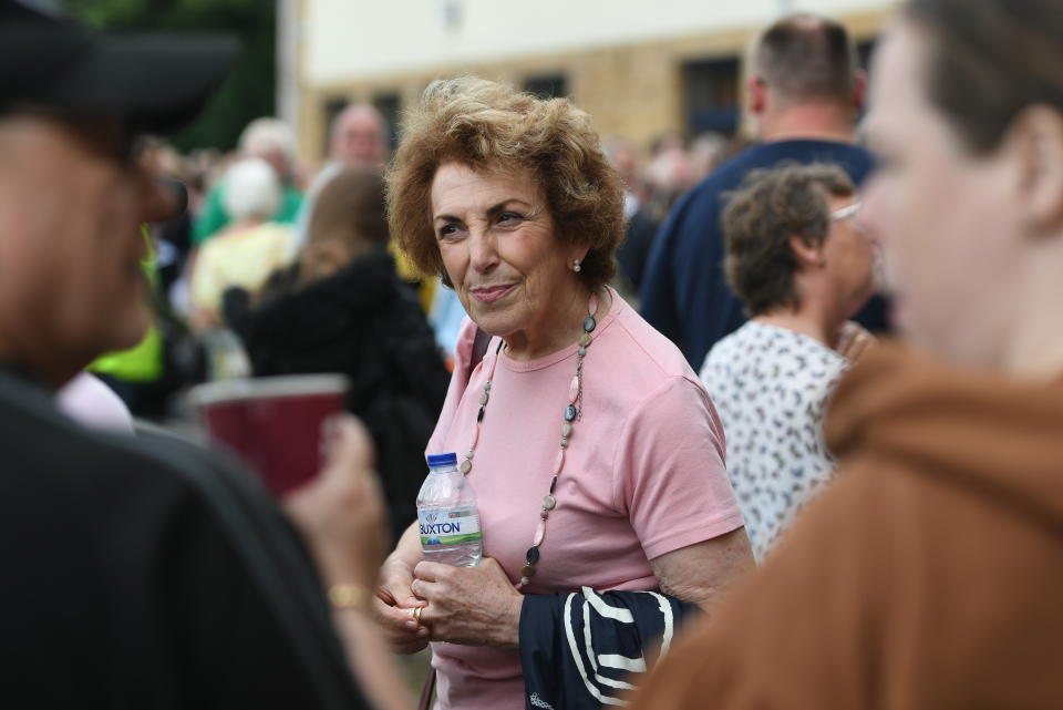 Edwina Currie with fellow residents from Whaley Bridge, who are queuing at a school in Chapel-en-le-Frith, where they will be hoping to find out when they are likely to be allowed back into their homes at a public meeting. (Photo by Joe Giddens/PA Images via Getty Images)