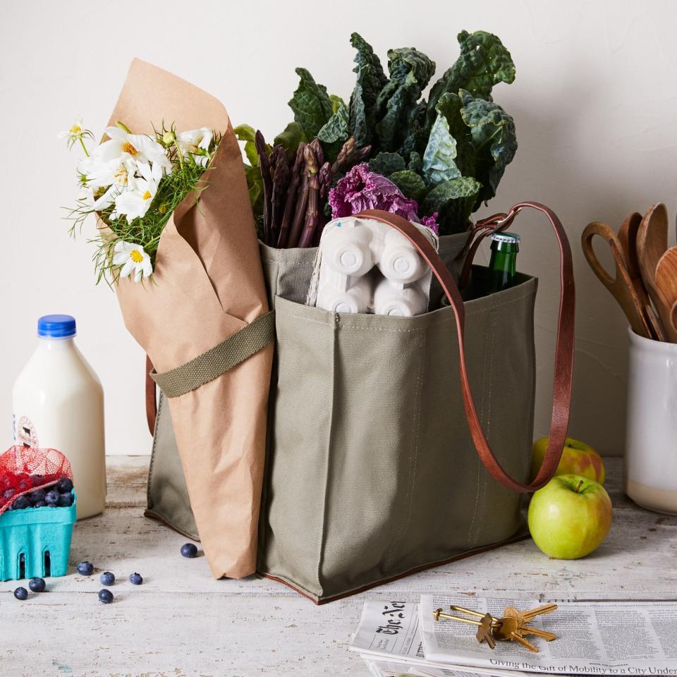 If they've been experimenting a lot and taking tons of trips to their local farmers' market, your friend will love this tote. It has pockets so that everything stays in place and even a seatbelt for flowers. <a href="https://fave.co/3etkaOE" target="_blank" rel="noopener noreferrer">Find it for $65 at Food52</a>. 