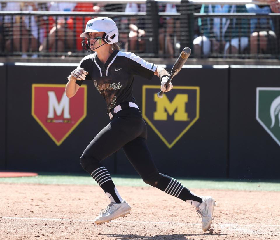 Allen Park's Makayla Sitarski bats against Macomb Dakota during the 5-0 win over Macomb Dakota in the Division 1 state final at Secchia Stadium on Michigan State campus on Saturday, June 18, 2022.