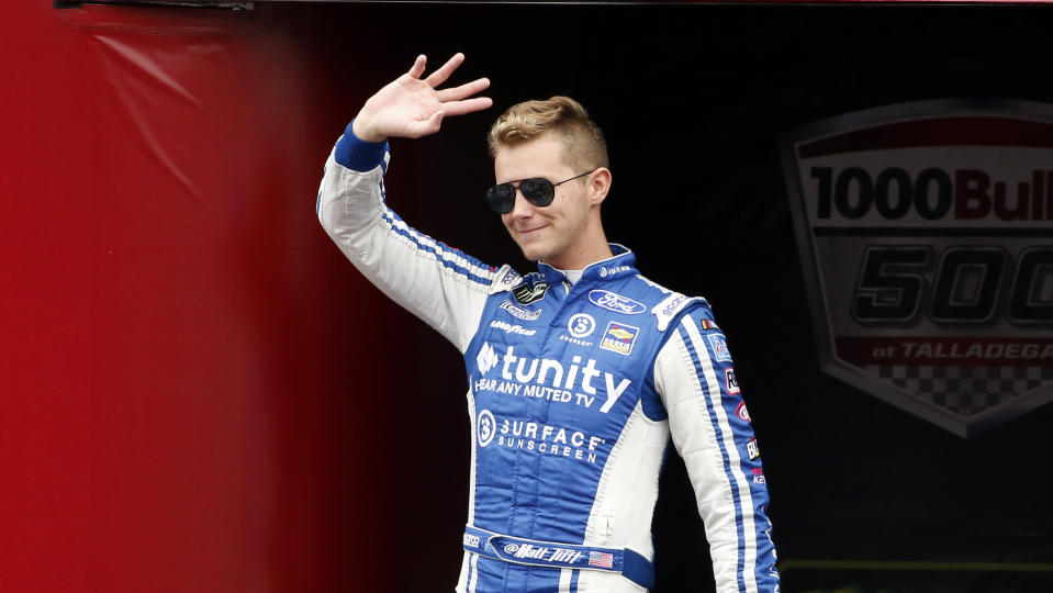 Monster Energy NASCAR Cup Series driver Matt Tifft (36) waves at driver introductions during a NASCAR Cup Series auto race at Talladega Superspeedway, Sunday, Oct. 14, 2019, in Talladega, Ala. (AP Photo/Butch Dill)