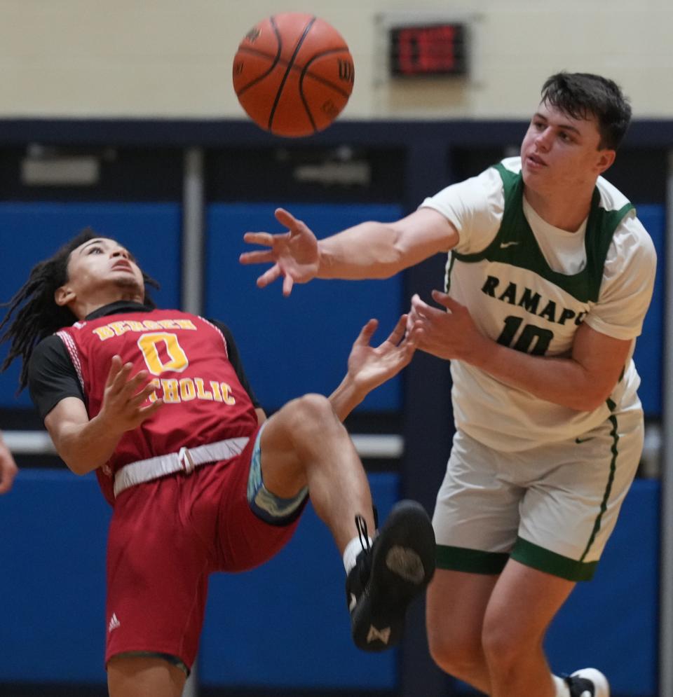 Hackensack, NJ -- February 10, 2024 -- Naiim Parrish of Bergen Catholic and Peyton Seals of Ramapo in the second half as Ramapo defeated Bergen Catholic 69-57 to win a quarterfinal game in the Bergen County Jamboree played in Hackensack.