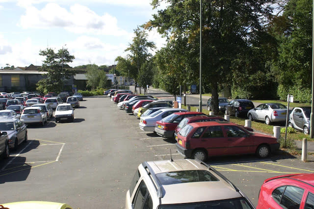 A view similar to that of a series of still pictures issued by Surrey police trying to trace missing schoolgirl Amanda Dowler who disappeared March 21, 2002. The pictures are from CCTV tapes which have been enhanced by the FBI.   *They show two cars - one dark, one light - driving down Station Avenue towards Walton Station. The dark car stops by the kerbside, is overtaken by the car following and a pedestrian appears to talk to the driver of the parked car. Detectives wish to speak to the driver of either vehicle. See PA story POLICE Teenager.  PA Photo: Surrey Police. Note to eds:  Police will be talking through these pictures in detail at a news conference later Thursday - and the full set of pictures they issued are available for downloading from the PA Bulletin Board.