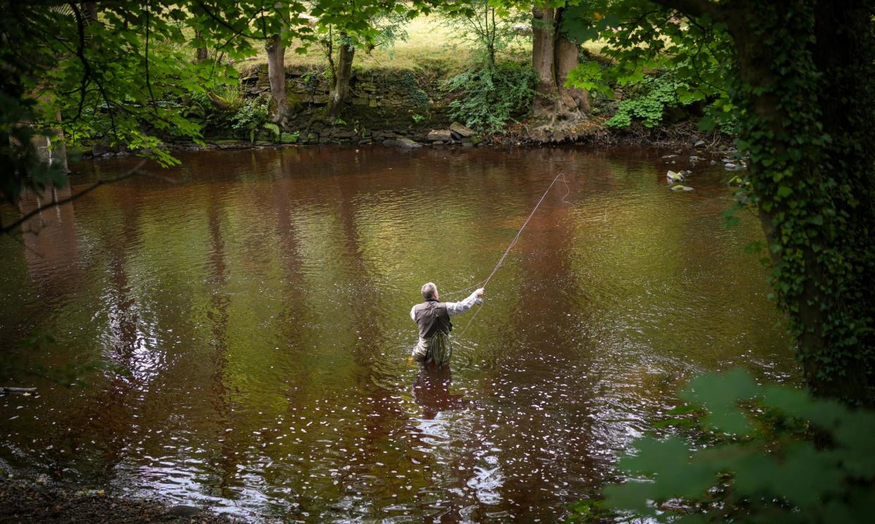 <span>An angler fishes on the River Derwent near Bakewell. The government has announced it will take measures to force water bosses to clean up waterways in England and Wales.</span><span>Photograph: Christopher Furlong/Getty Images</span>