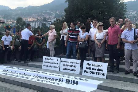 Mayors and councillors of Bosnia's north western towns protest in front of Parliament in Sarajevo, Bosnia and Herzegovina, July 26, 2018. REUTERS/Maja Zuvela