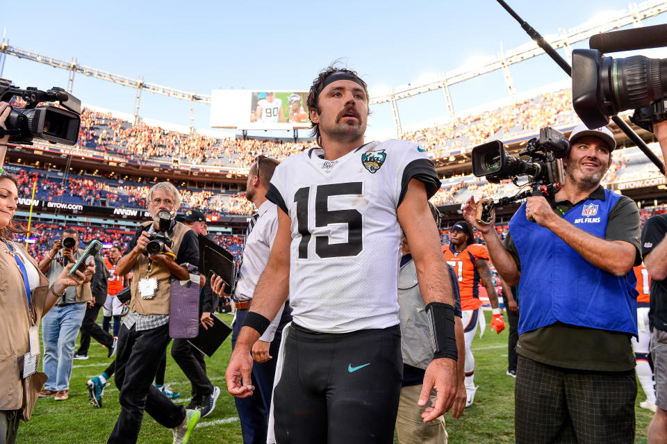 DENVER, CO - SEPTEMBER 29:  Gardner Minshew #15 of the Jacksonville Jaguars walks on the field after a 26-24 win over the Denver Broncos at Empower Field at Mile High on September 29, 2019 in Denver, Colorado. (Photo by Dustin Bradford/Getty Images)