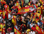 <p>A demonstrator waves a pre-constitutional Spanish flag in front of city hall during a demonstration in favor of a unified Spain a day before the banned October 1 independence referendum, in Madrid, Spain, Sept. 30, 2017. (Photo: Sergio Perez/Reuters) </p>