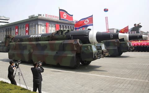 The Hwasong 12 is paraded across Kim Il Sung Square during a military parade in Pyongyang in April - Credit: AP