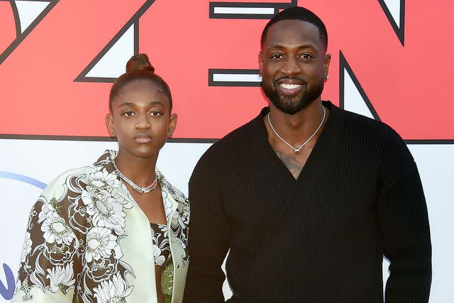 <p>Gilbert Flores/Variety/Penske Media via Getty</p> Zaya Wade and Dwyane Wade attend the "Cheaper By The Dozen" L.A. premiere on March 16, 2022