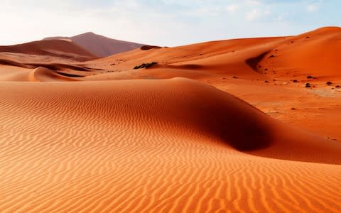 Red desert dune in Sossusvlei National Park, Namibia - Credit: Getty Images