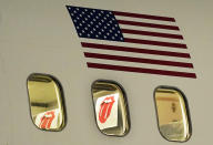 The Rolling Stones logo is seen inside the windows of a plane carrying the band after they landed at Hollywood Burbank Airport in Burbank, Calif., Monday, Oct. 11, 2021, ahead of their shows this week at SoFi Stadium in Inglewood, Calif., for their "NO FILTER" tour. (AP Photo/Chris Pizzello)