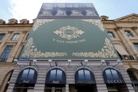 A view shows an advertising poster for the new high end jewellery Gucci store on Place Vendome in Paris