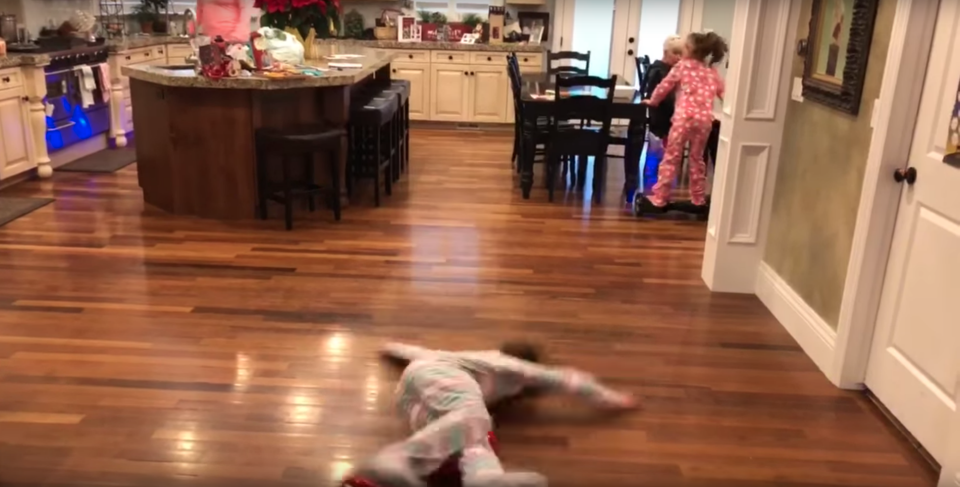 She completely stacks it onto the floor. Photo:YouTube/Kids Getting Hurt