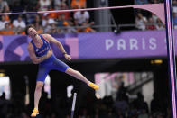 Anthony Ammirati, of France, competes in the men's pole vault qualification at the 2024 Summer Olympics, Saturday, Aug. 3, 2024, in Saint-Denis, France. (AP Photo/Bernat Armangue)