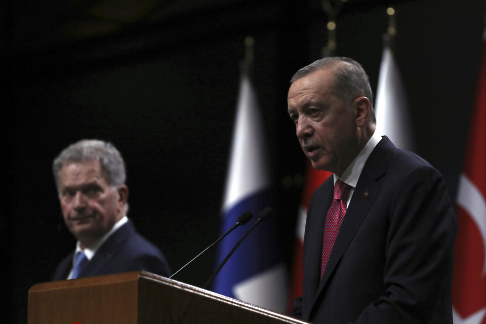 Turkish President Recep Tayyip Erdogan, right, speaks next to Finland's President Sauli Niinisto during a press conference at the presidential palace in Ankara, Turkey, Friday, March 17, 2023. Turkey's President Recep Tayyip Erdogan said Friday that his government would move forward with ratifying Finland's NATO application, paving the way for the country to join the military bloc ahead of Sweden. (AP Photo/Burhan Ozbilici)
