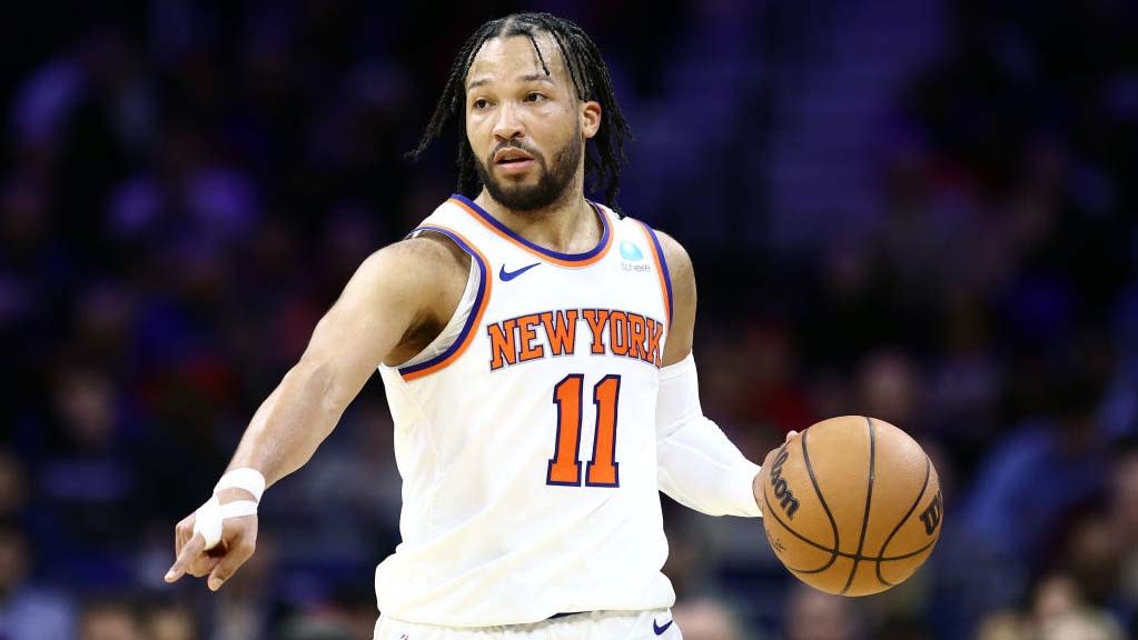  Jalen Brunson #11 of the New York Knicks dribbles during the third quarter against the Philadelphia 76ers at the Wells Fargo Center on February 22, 2024 . 