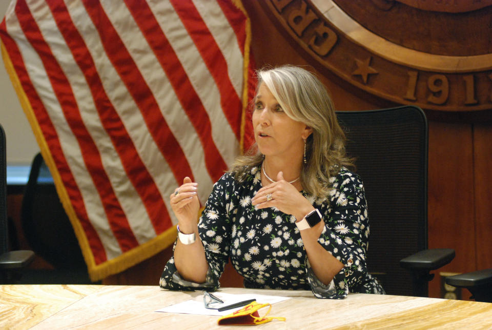 FILE — In this July 29, 2021, file photo New Mexico Gov. Michelle Lujan Grisham speaks at a news conference in Santa Fe, N.M. The governor signed an executive order Wednesday, Aug. 25, 2021, making New Mexico the latest western state to join an ambitious effort to conserve nearly one-third of America's lands and waters by 2030. (AP Photo/Morgan Lee, File )