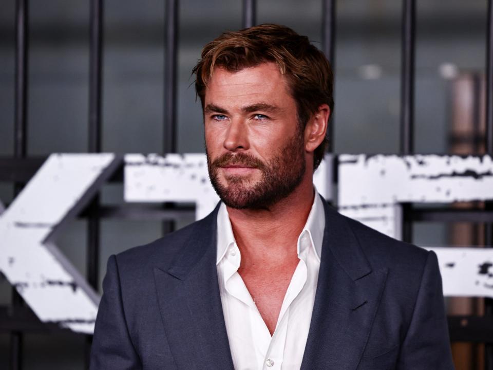 Actor Chris Hemsworth poses for a photo at the premiere of the film "Extraction 2" in New York.