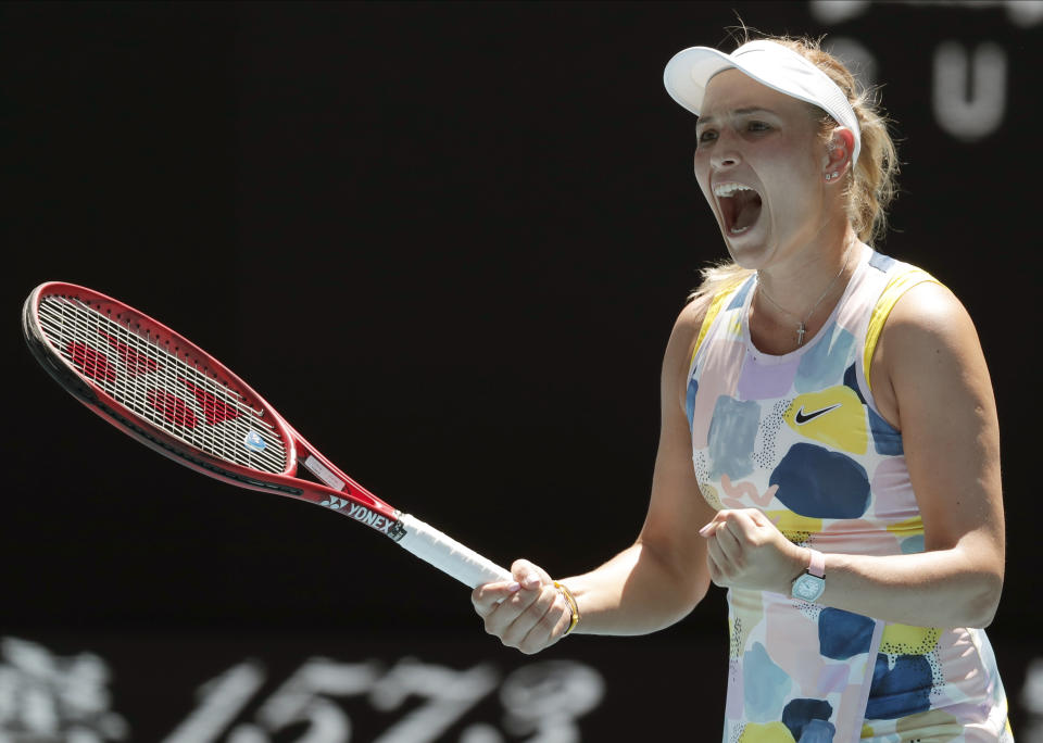 Croatia's Donna Vekic celebrates after defeating Russia's Maria Sharapova in their first round singles match at the Australian Open tennis championship in Melbourne, Australia, Tuesday, Jan. 21, 2020. (AP Photo/Lee Jin-man)