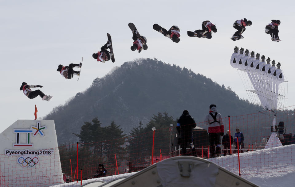 <p>In this multiple exposure image Laurie Blouin, of Canada, jumps during qualification for the women’s big air snowboard competition at the 2018 Winter Olympics in Pyeongchang, South Korea, Monday, Feb. 19, 2018. (AP Photo/Dmitri Lovetsky) </p>